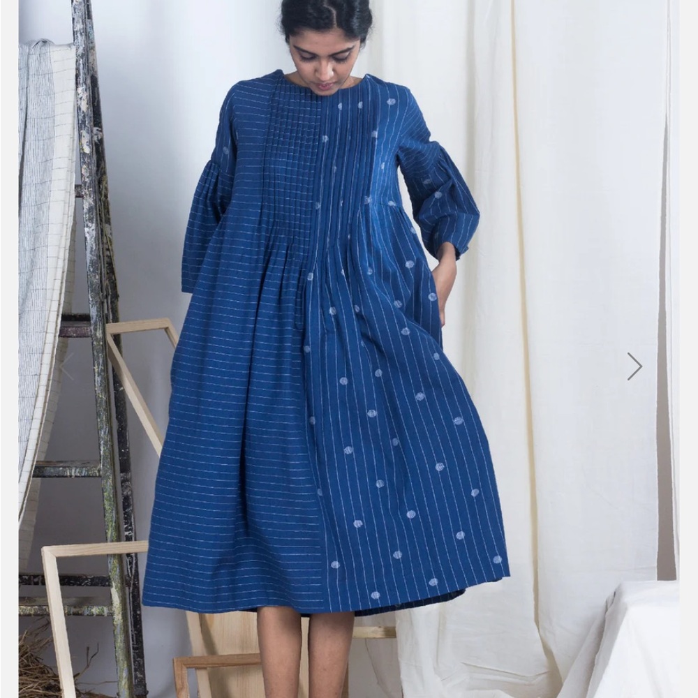 Lovely baby dress with pockets by sustainable brand Karnam